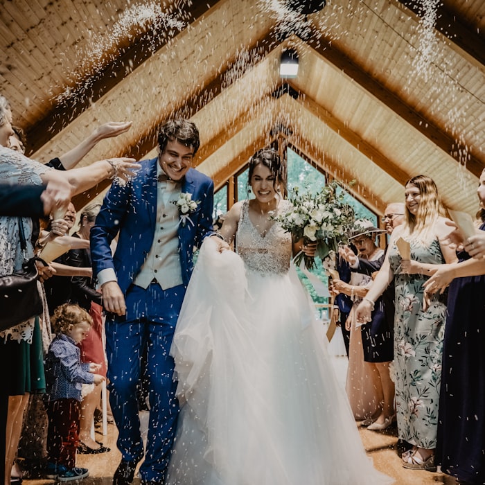 Guests dancing under warm lights at a party